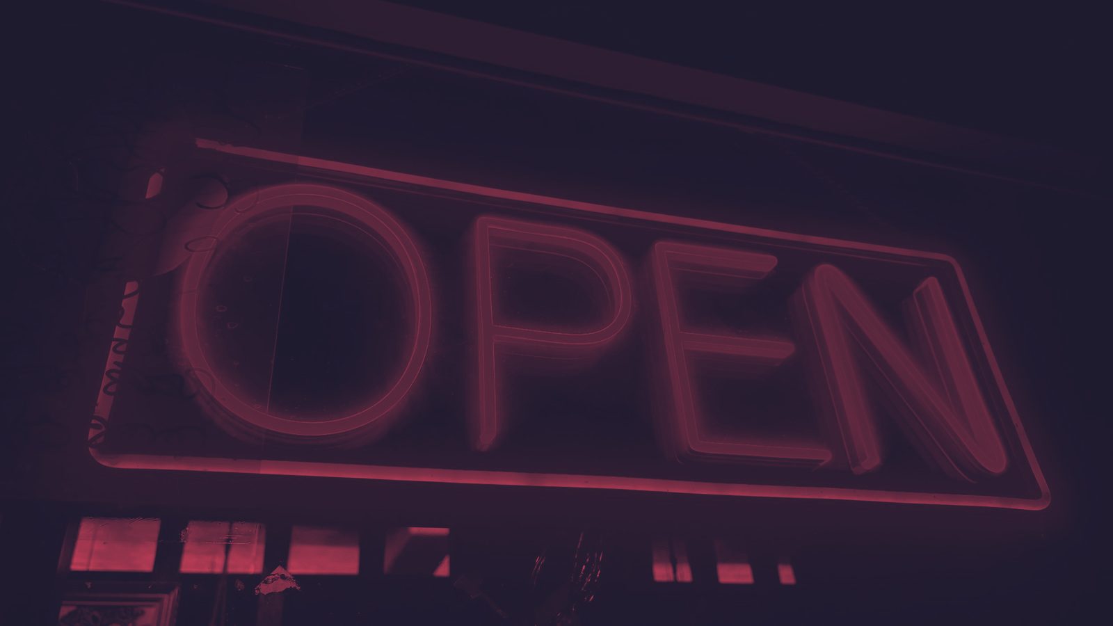 The same photo as a duotone: dark navy shadows and neon pink highlights