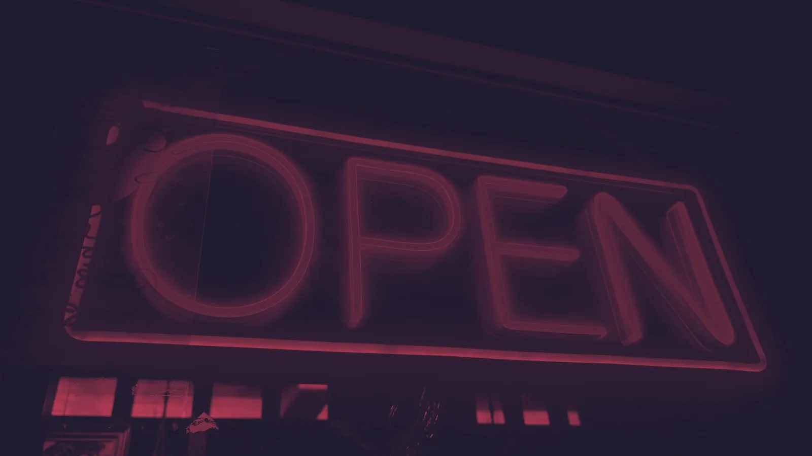 The same photo as a duotone: dark navy shadows and neon pink highlights